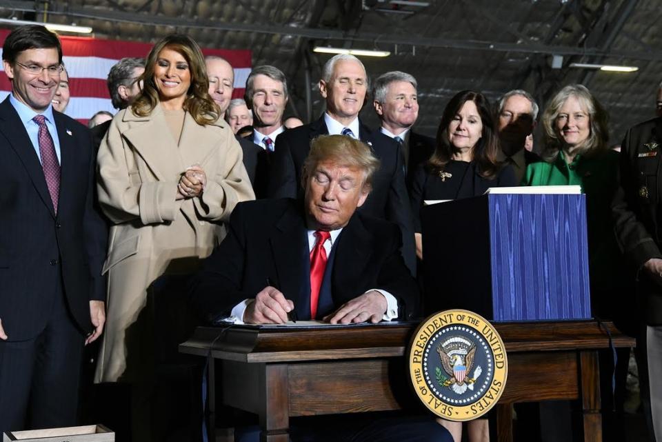 President Trump signing the National Defense Authorization Act